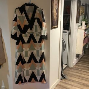 xl split skit dress. Pockets funky design. 3/4 sleeve . Light material